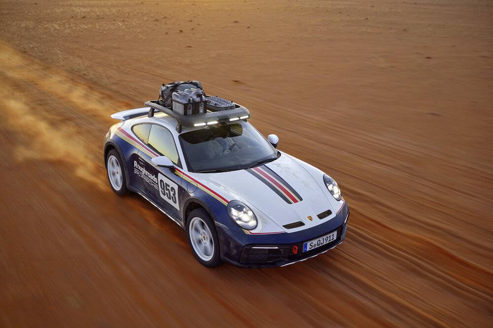 Porsche prezentē jauno bezceļu sacīkšu auto 911 Dakar 14 Porsche prezentē jauno bezceļu sacīkšu auto 911 Dakar