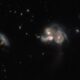 Ar Habla teleskopu atklāj trīs masīvas galaktikas, kas saplūst vienā
